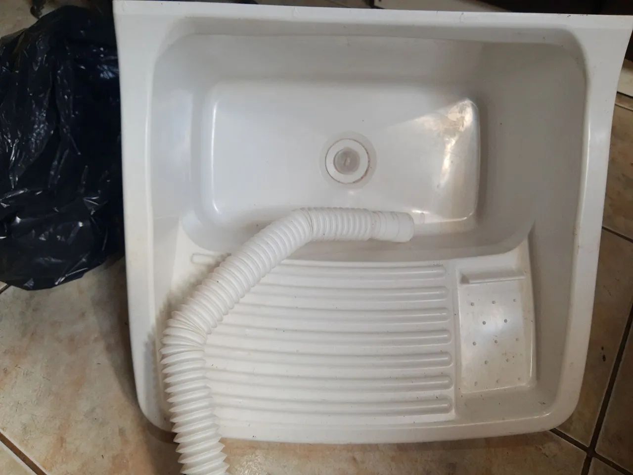 Lava roupa de plástico 