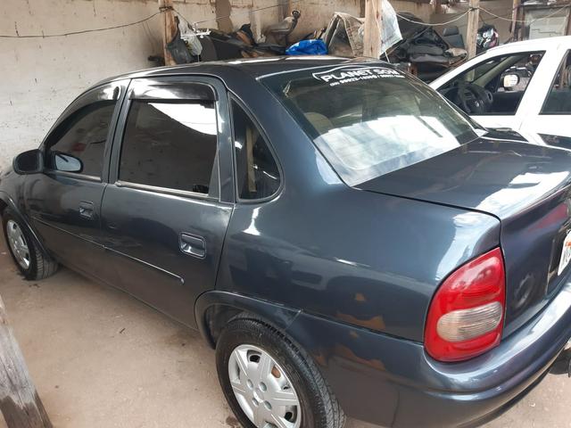 Corsa sedã
