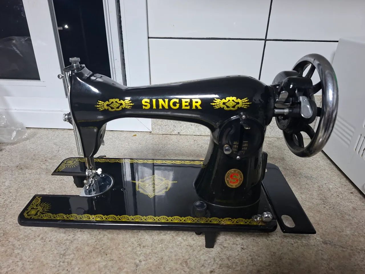 Máquina de costura Singer64684592297473120