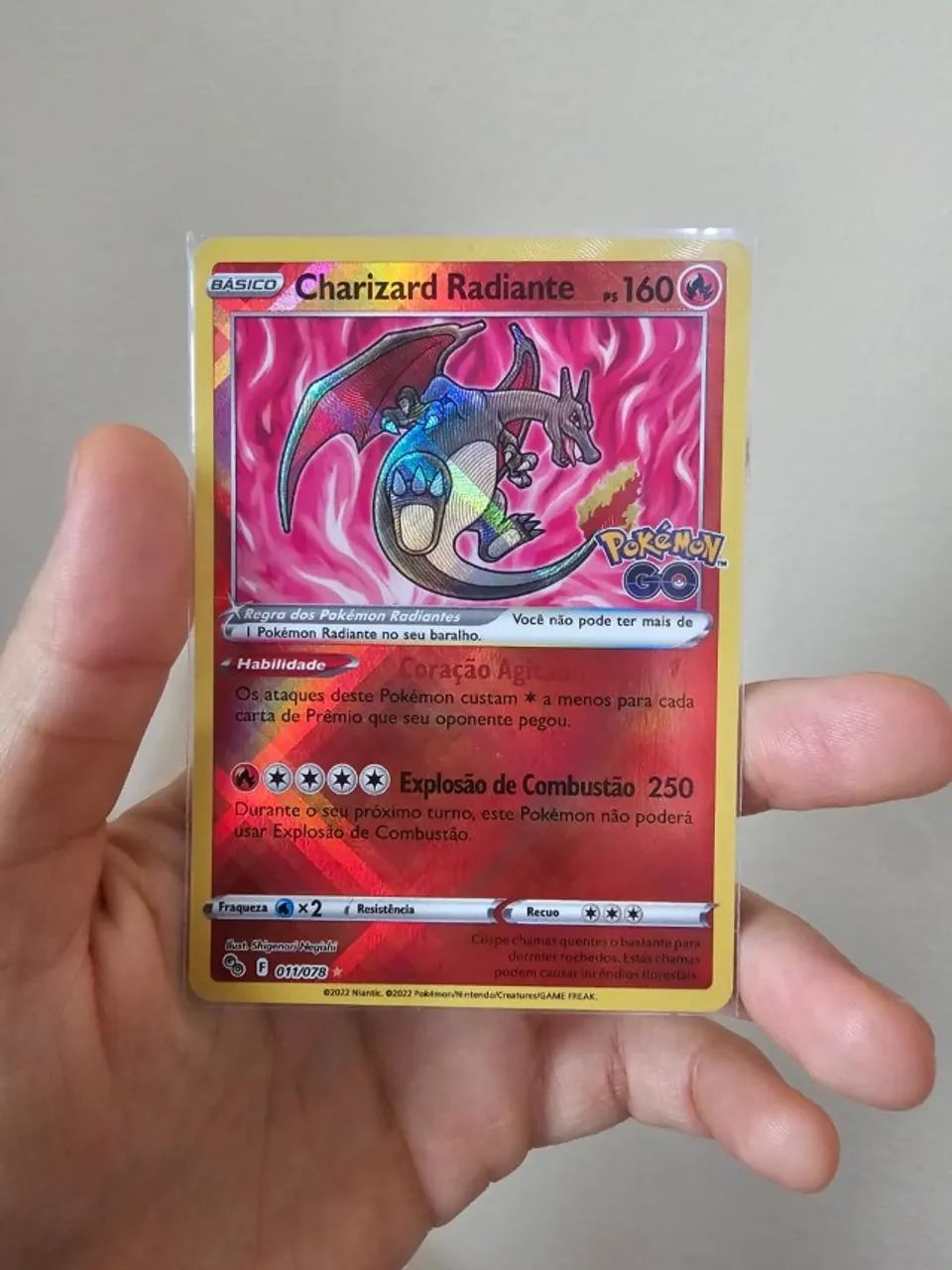 Carta Pokémon Charizard Radiante (011/078) 