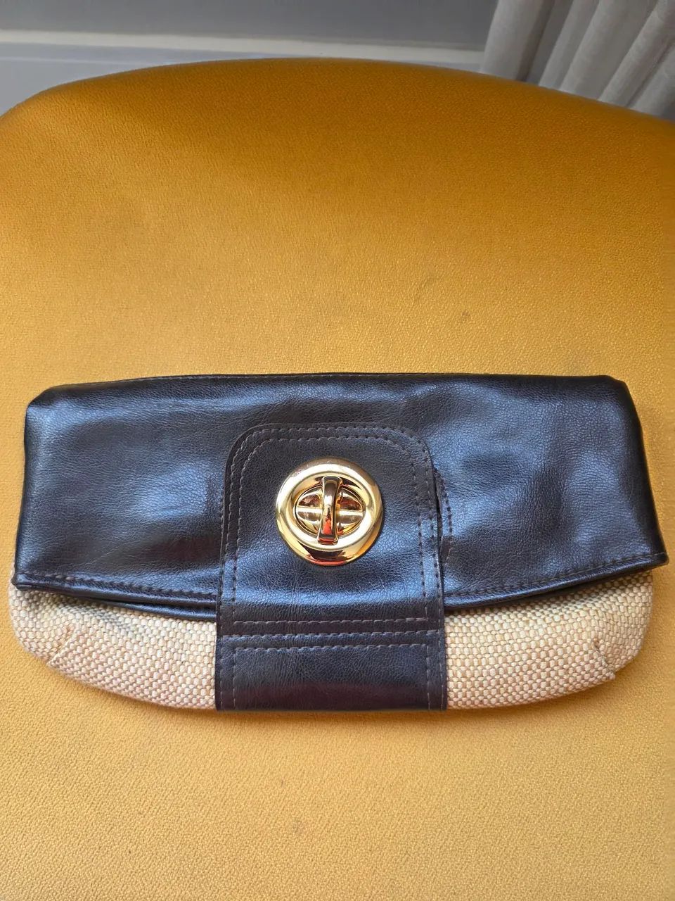 Bolsa Clutch versatil