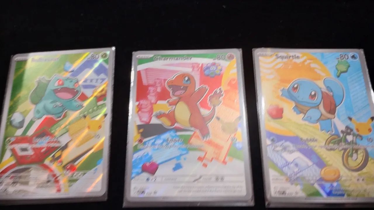 Três cartas Pokémon