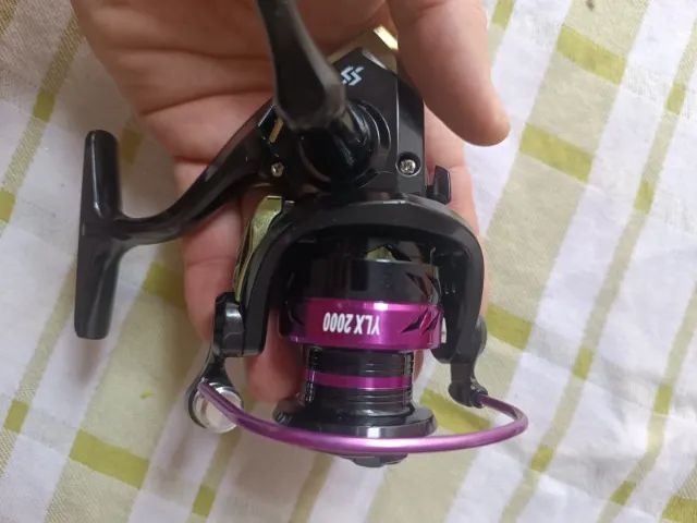 Molinete para pesca serie 2000YLX novo na caixa - Foto 6