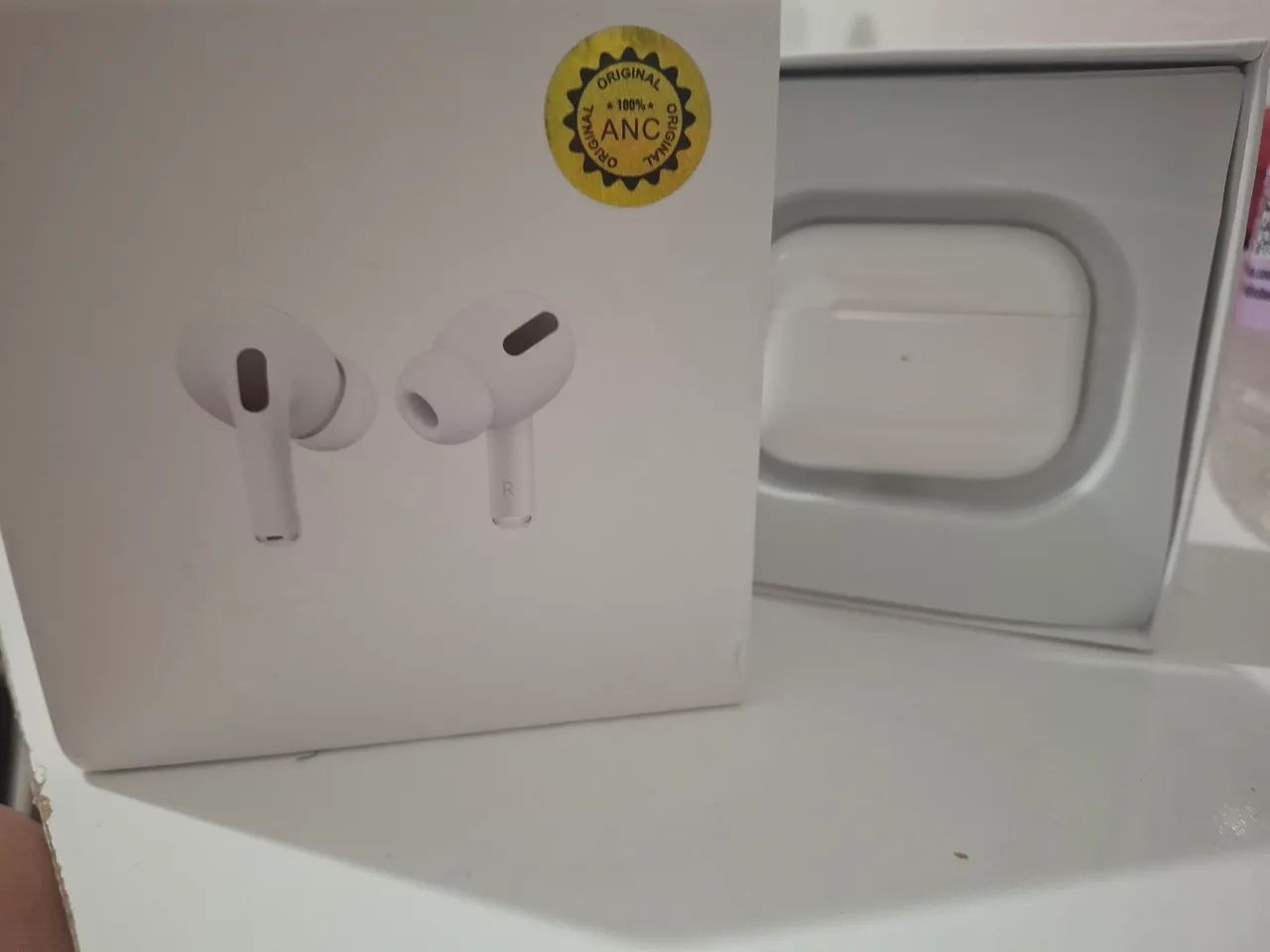 Airpods usado.