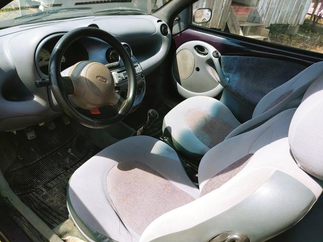Ford Ka 99 quitado 420$ de documento e uma multa pro ano que vem de 880$