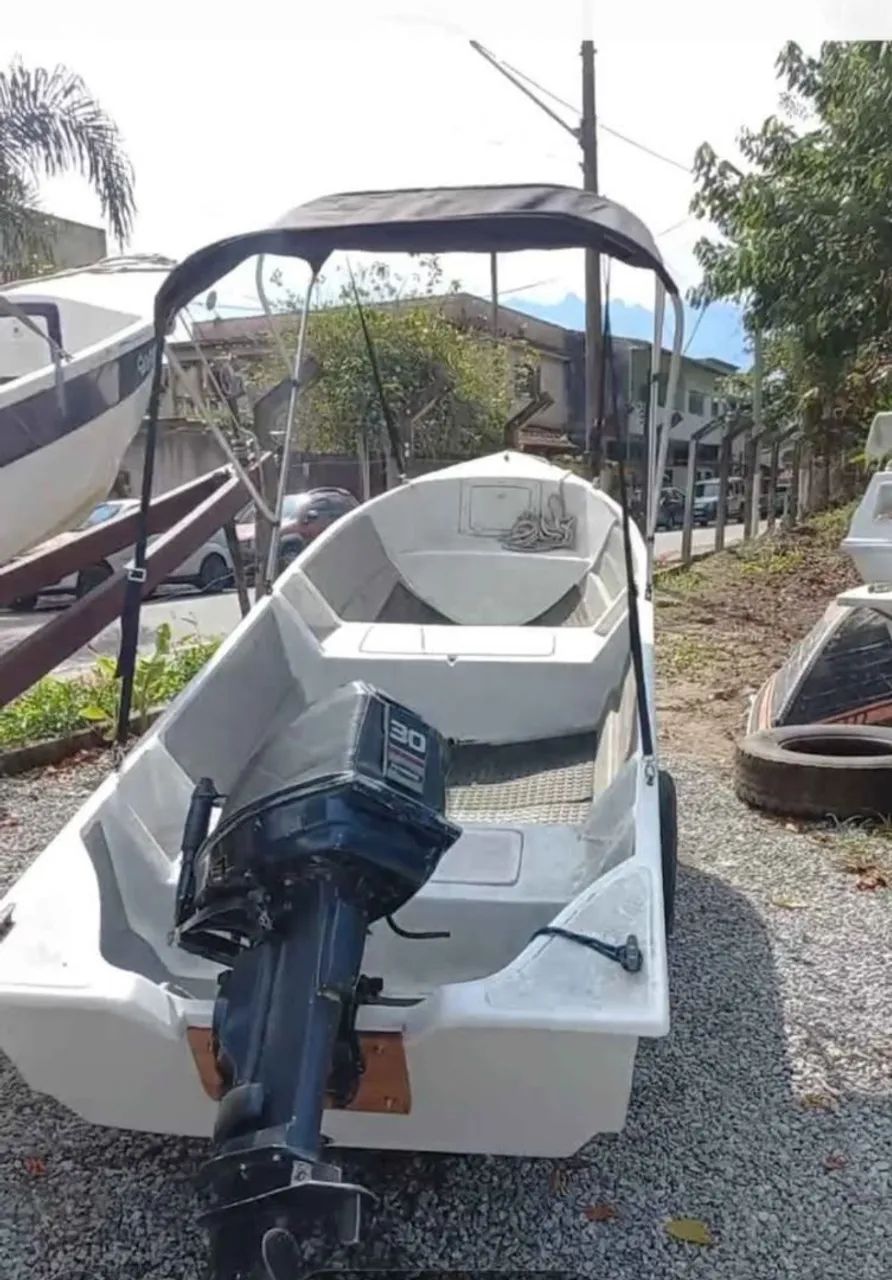 Bote 4,40m com motor evinrude 30hp e carreta  - Foto 4