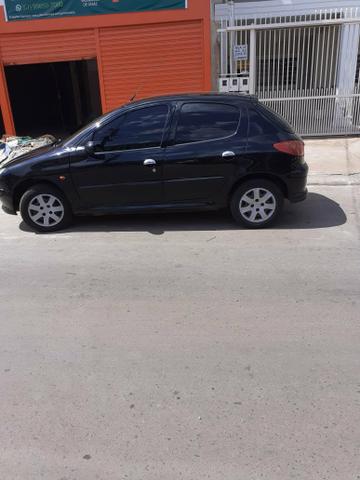 Peugeot em dias vendo ou troco por moto