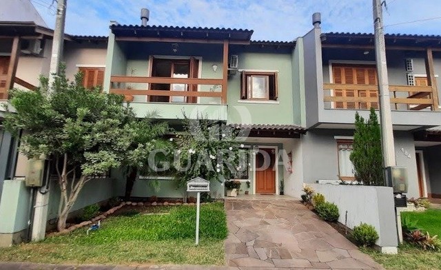 Casa em Condomínio para comprar no bairro Hípica - Porto Alegre com 3 quartos
