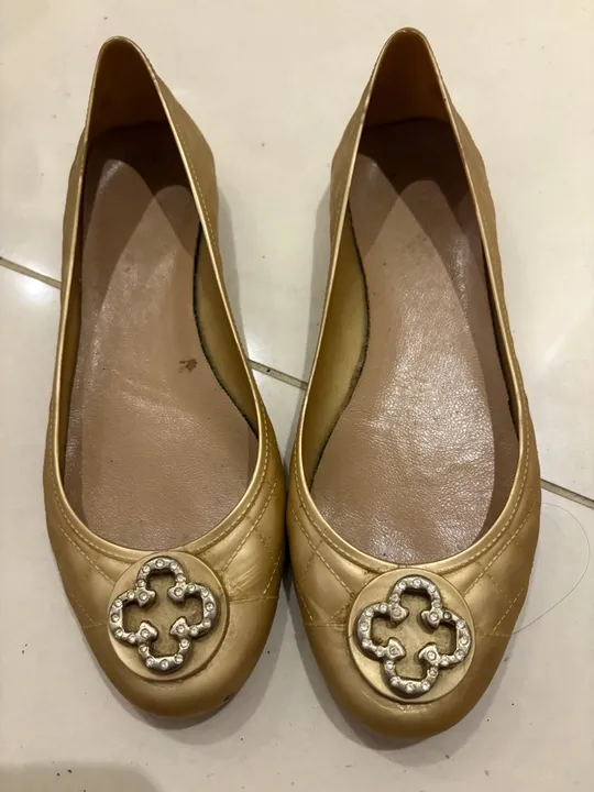 Sapatilhas Douradas