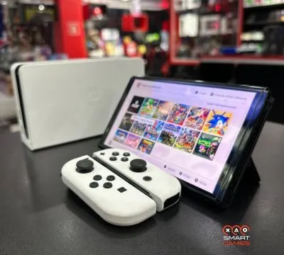 NINTENDO SWITCH OLED SEMINOVO TUNADO COM JOGOS - PRONTO PARA A DIVERSÃO!