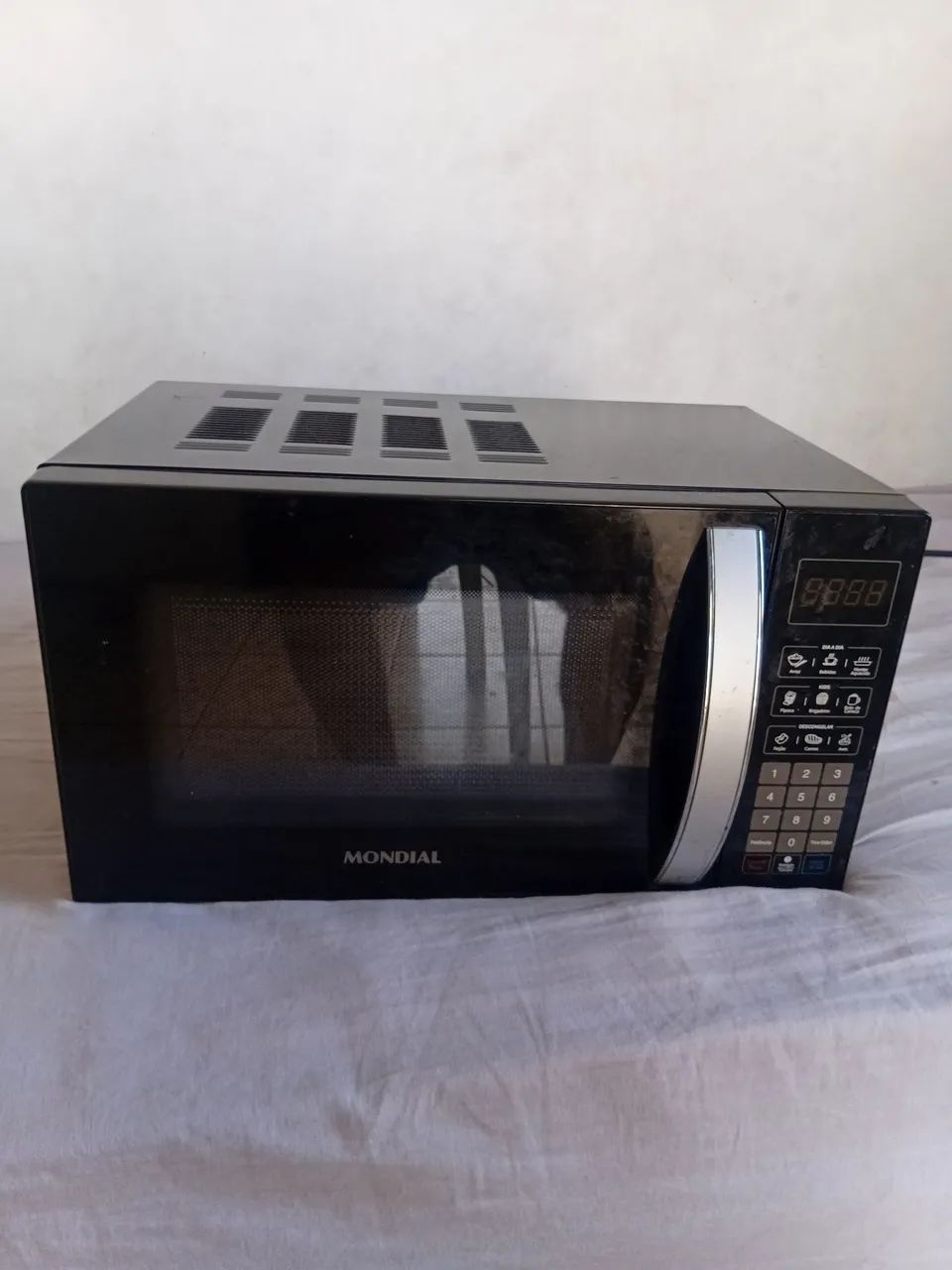 Micro-ondas Mondial com defeito 