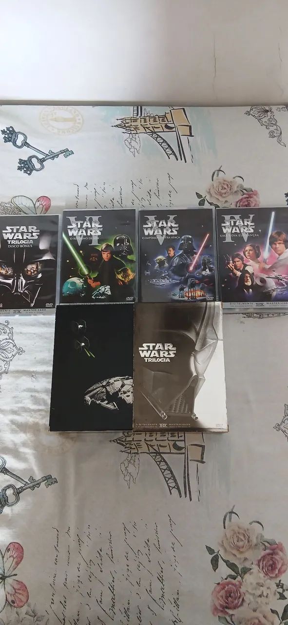 2 trilogias Star Wars com Box 
