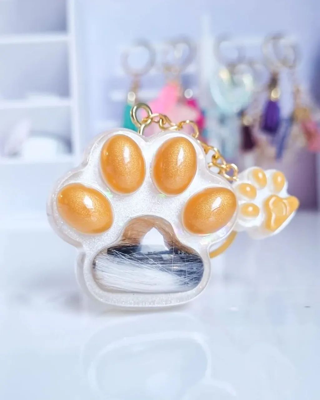 Chaveiro pelinhos de pet patinha