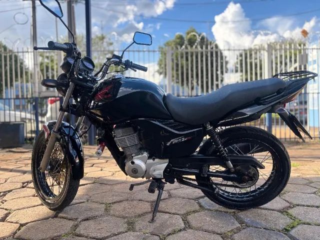 Moto top com partida elétrica e  freios   a disco 