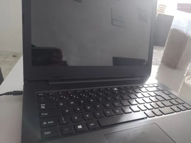 Notebook Positivo usado, revisado, funcionando.