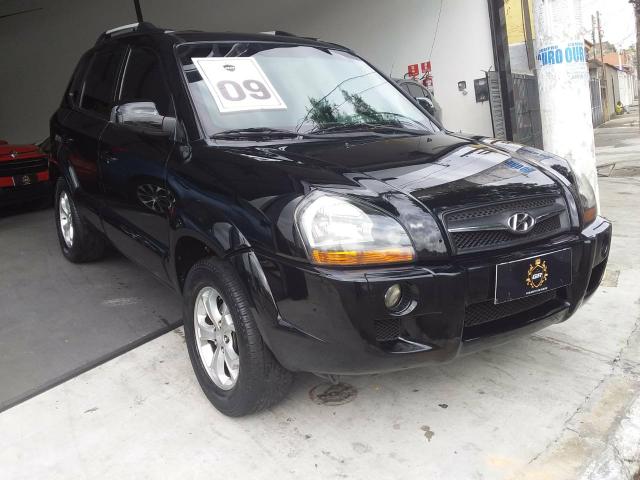 Hyundai Tucson gls 2.0 V6 4x4 AUT 2009 - Foto 5