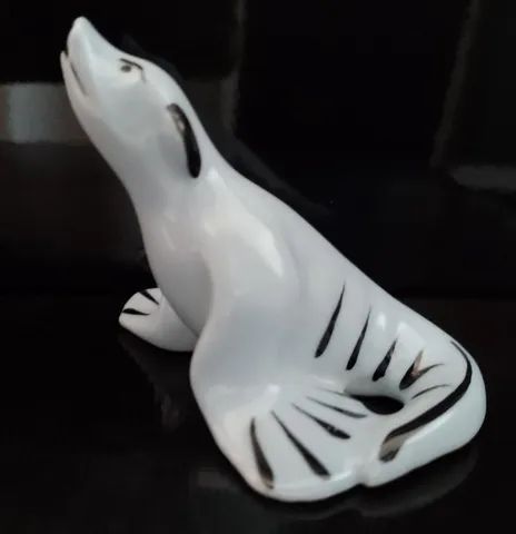 Lindo bibelô foca de porcelana 