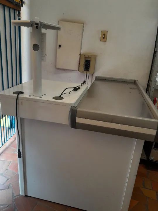 Checkout - em bom estado de conservação