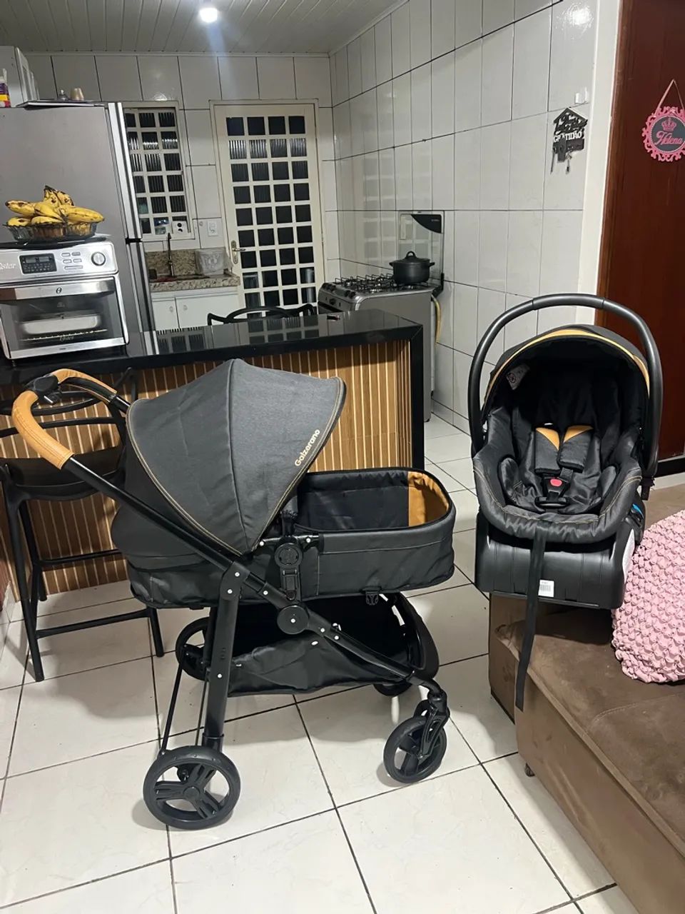 Carrinho com bebê Conf e base Olympos 