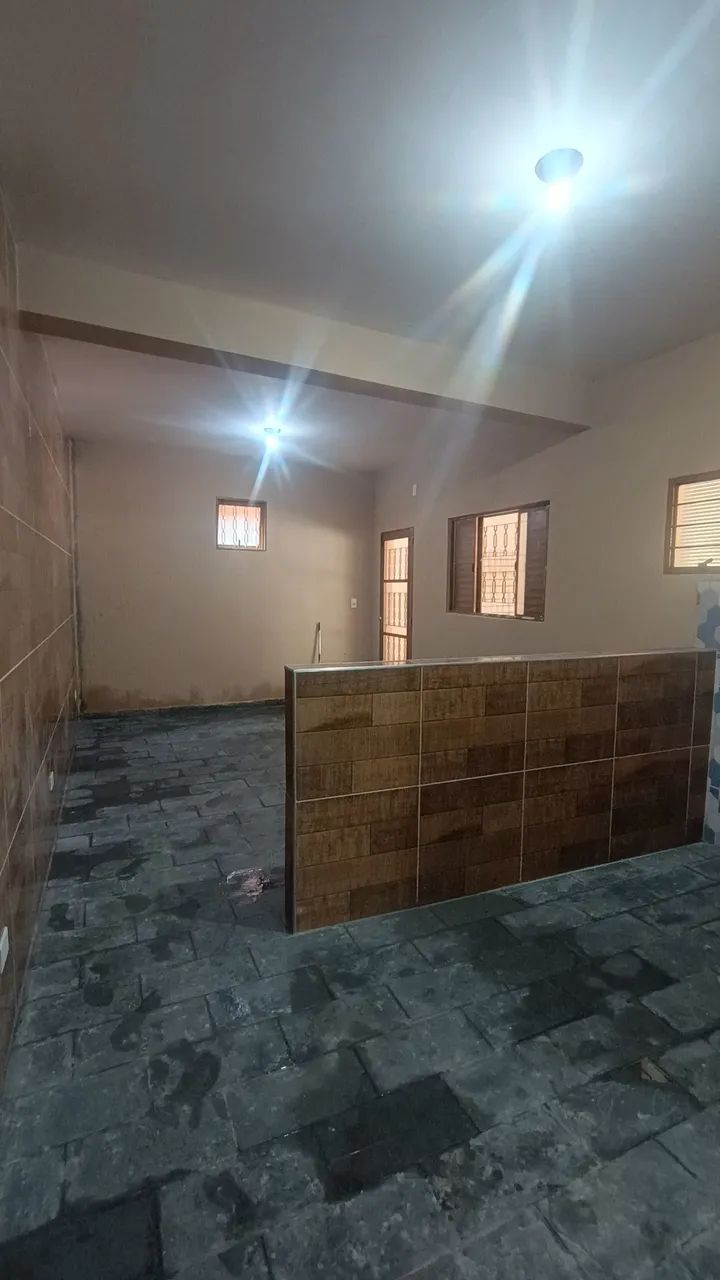 Kitnet com um quarto e uma vaga de garagem