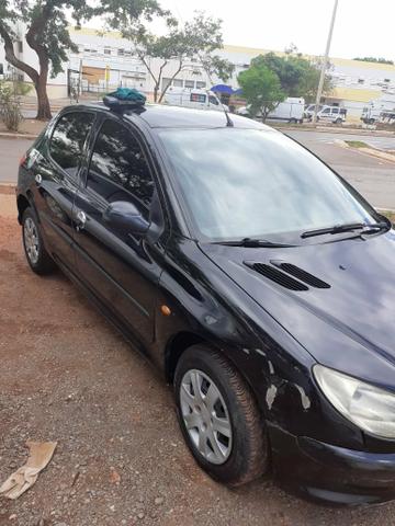 Peugeot em dias vendo ou troco por moto - Foto 3