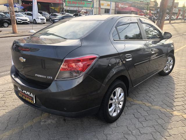 Prisma ltz 2015 entr: 2.990,00 mais x 899,90 - Foto 6