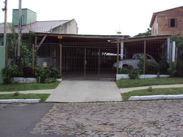 Estacionamento c/ casa de moradia