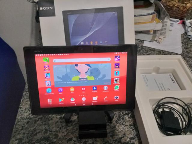 Tablet sony z2, faz ligação como celular aprova de água, carregador magnético, na caixa