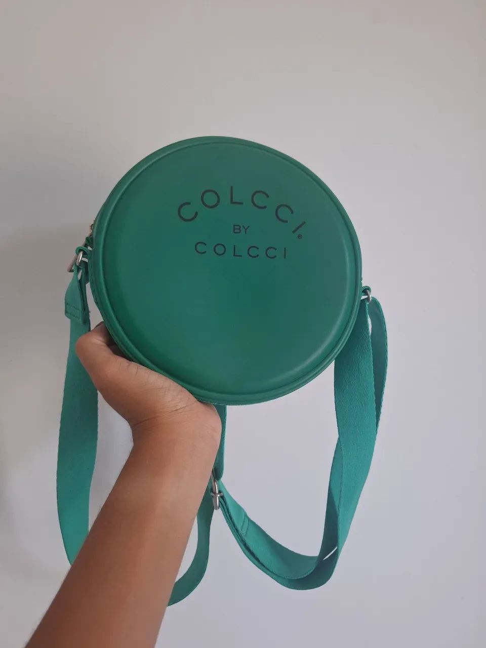 Bolsa verde redonda . Usada