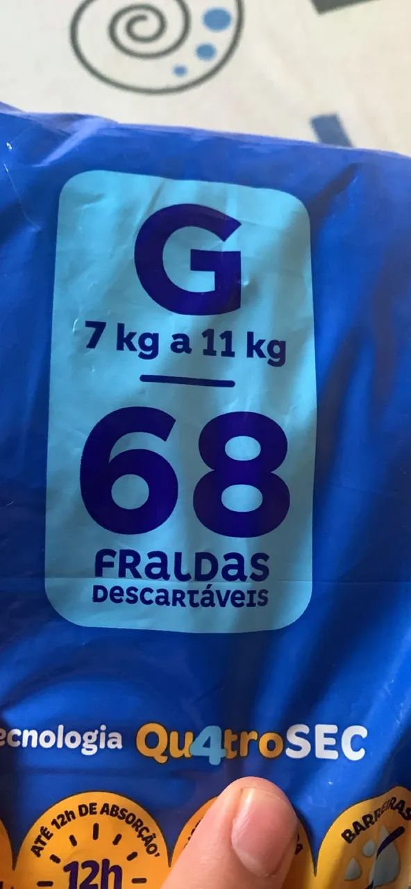 Vendo pacote de fralda NOVO LACRADO - Foto 3