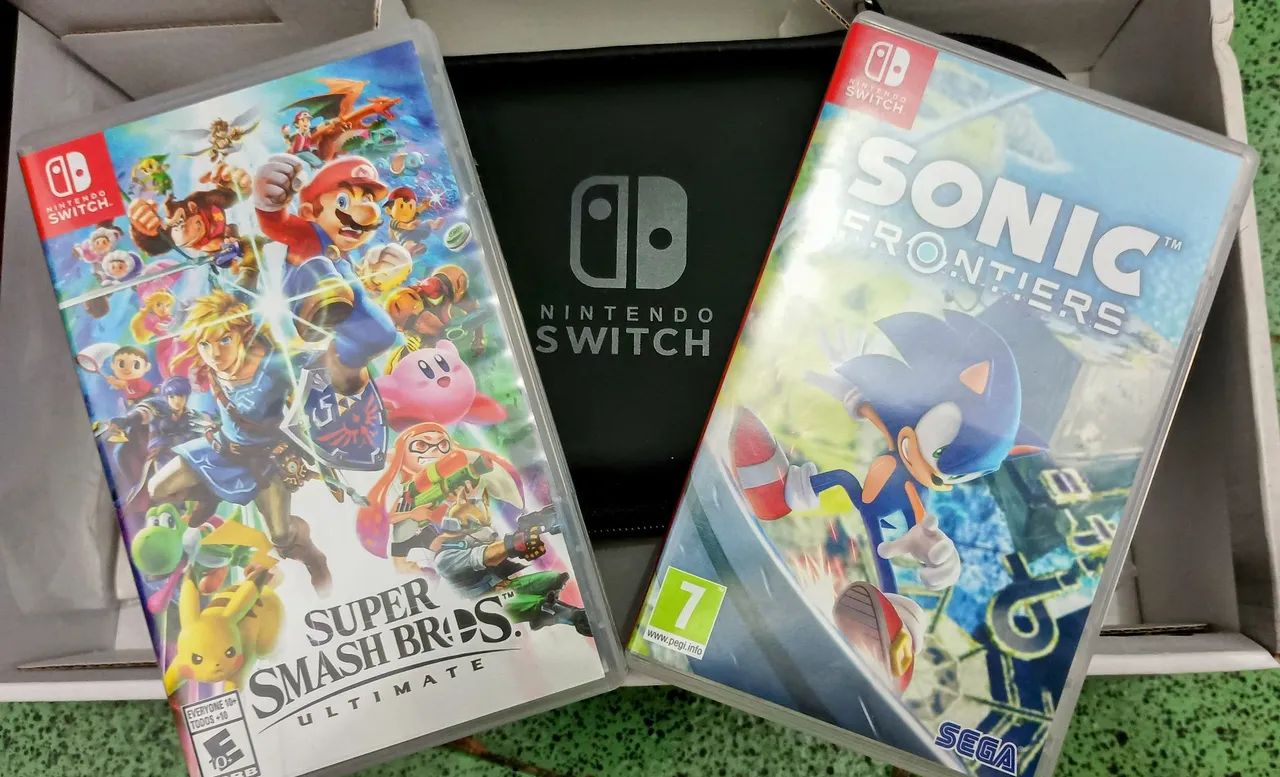 Nintendo Switch V1 unlockable + 2 games + accessories64318471863425120