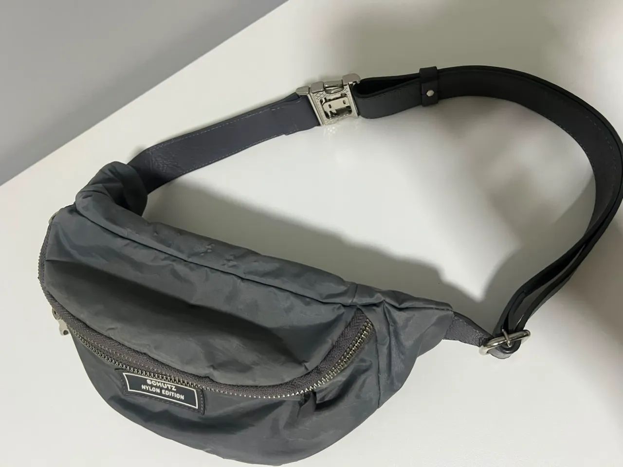 Pochete bolsa couro Schutz 