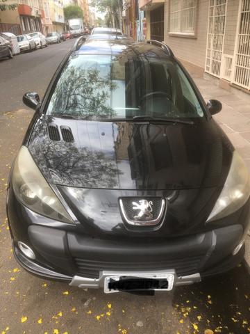 Peugeot 207 escapade barbada - Foto 11