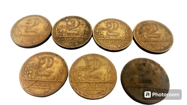 7 moedas de 2 cruzeiros bronze  várias datas