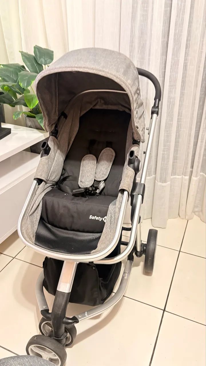 Carrinho de bebê com bebê conforto e suporte para veículo  - Foto 2