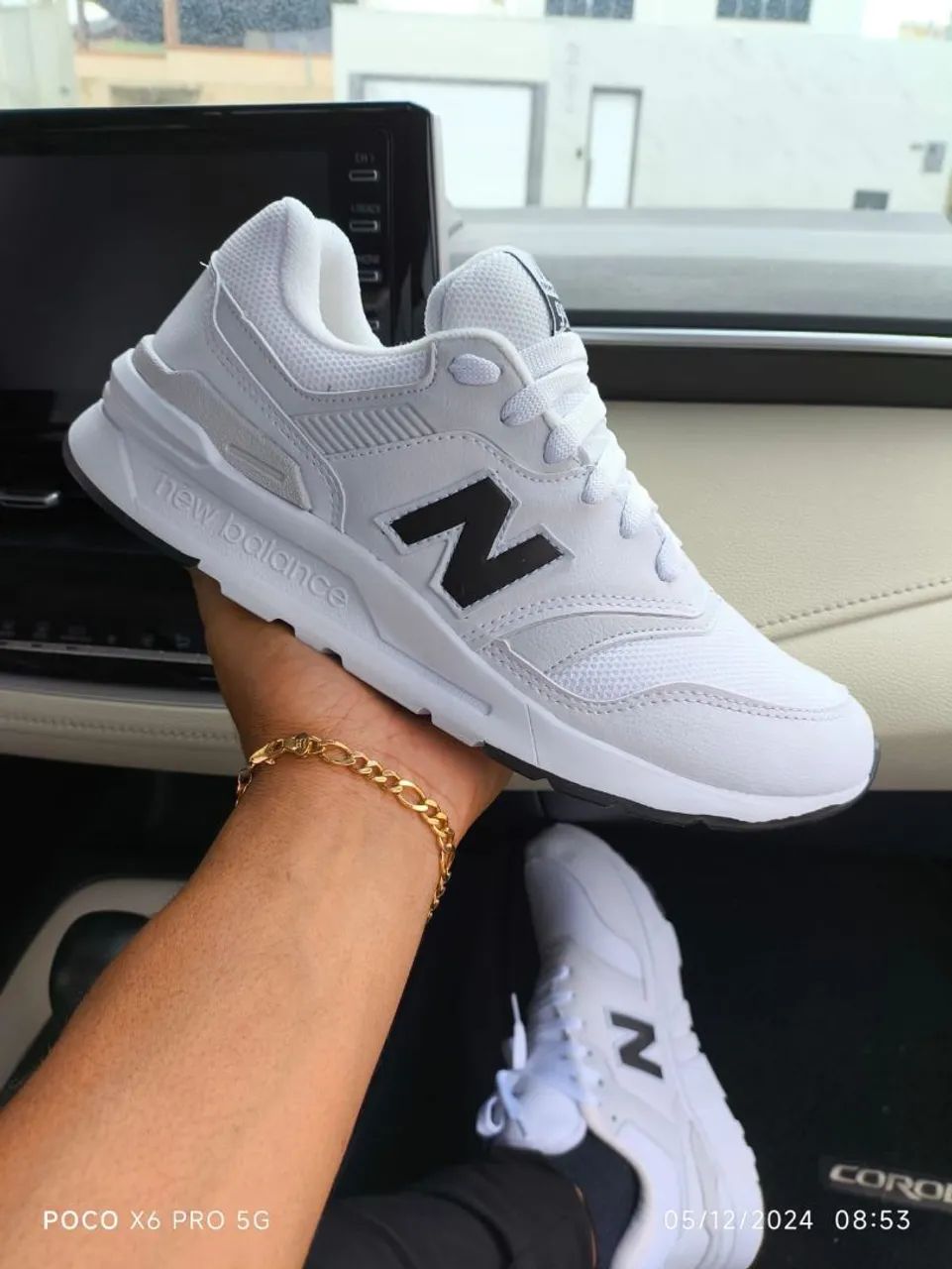 Tênis NB