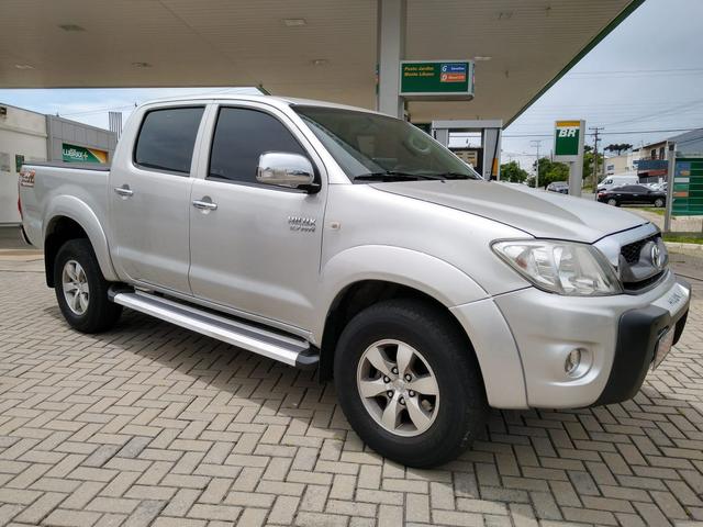 Toyota Hilux CD SR 2.7 WTi 2010 GASOLINA - Foto 2