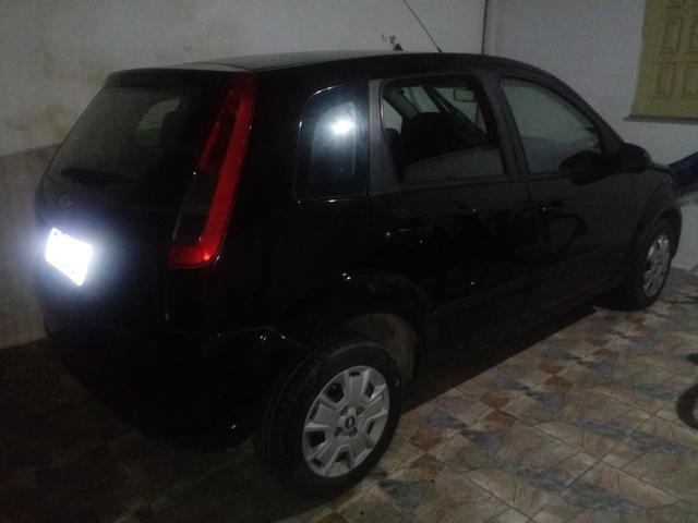 Vendo carro Ford fiesta hatch Flex 1.0 completo - Foto 3