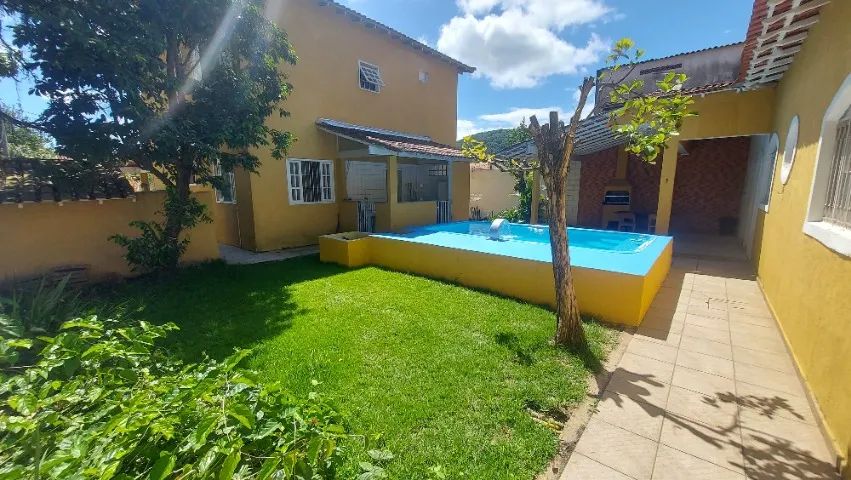TEMPORADA Linda casa ampla , piscinão  em terrenão ótima localização