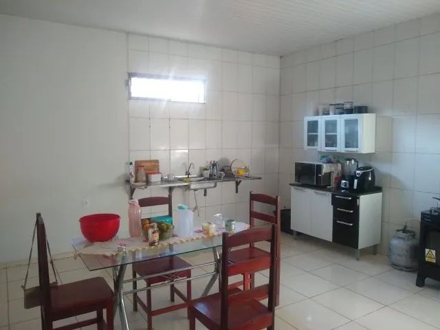 CASA QUITADA, 02 QUARTOS SENDO SUÍTE, SALA, COZINHA GRANDE - Foto 2