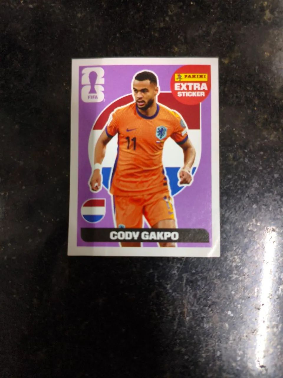 Figurinha EXTRA Cody Gakpo regular(bordô) 2026