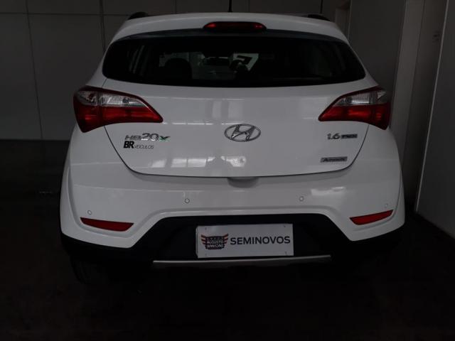 HYUNDAI HB20X 1.6 16V PREMIUM FLEX 4P AUTOMÁTICO - Foto 4