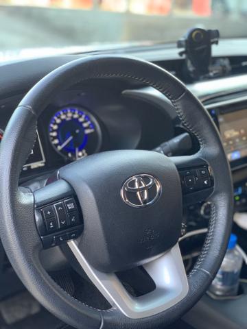 Hilux SRX 17/18 diesel leia todo anúncio - Foto 7