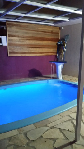 Casa com piscina muito aconchegante.