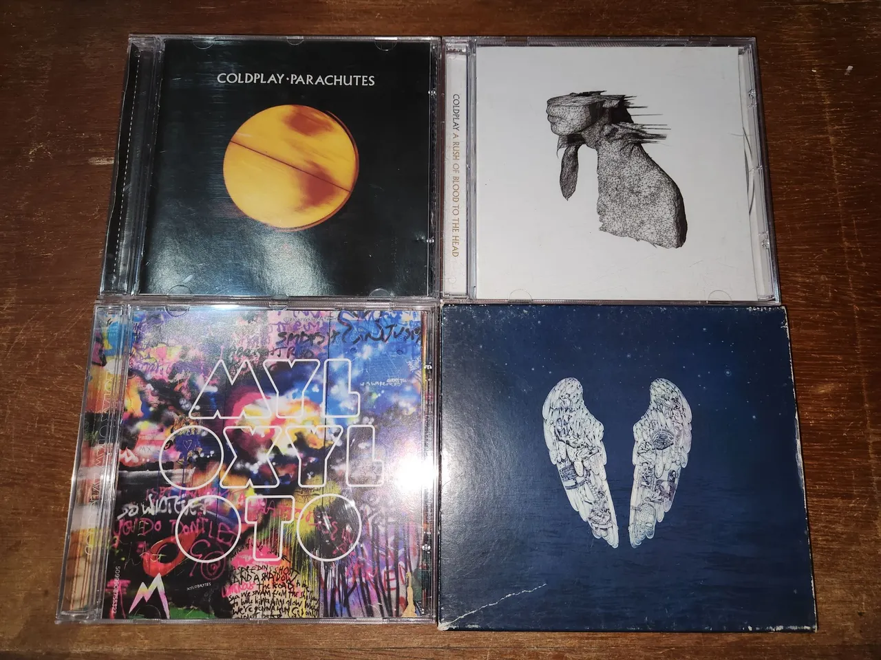 CD Coldplay Parachutes, A Rush of Blood to the Head, Mylo Xyloto e Ghost Stories