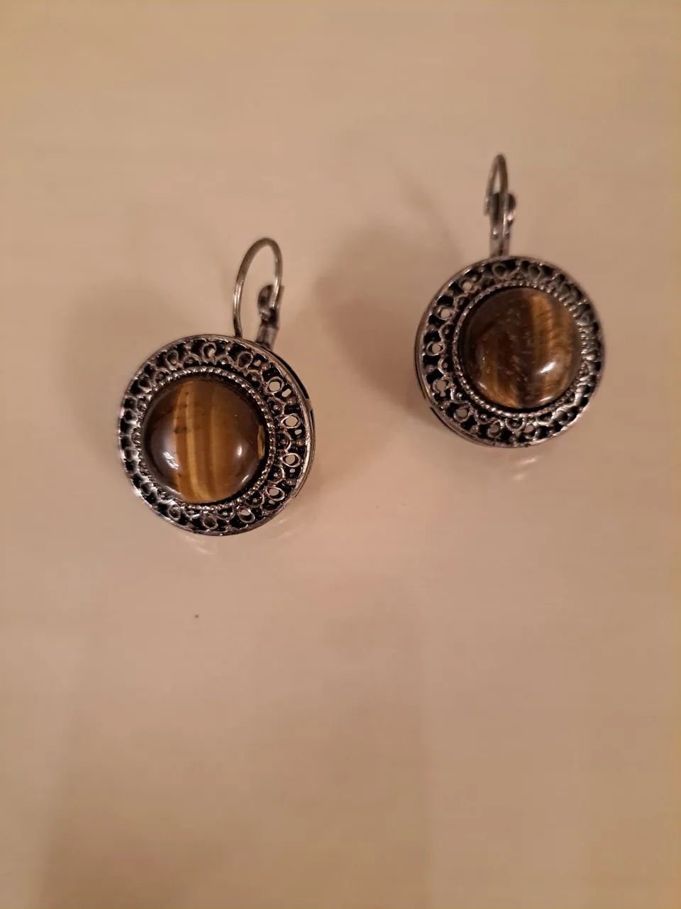 Brincos de olho de tigre - Foto 2