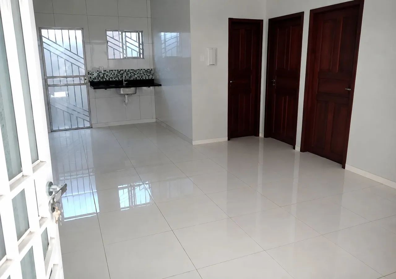 Apartamento 2 quartos sala cozinha integrada banheiro área de serviço 