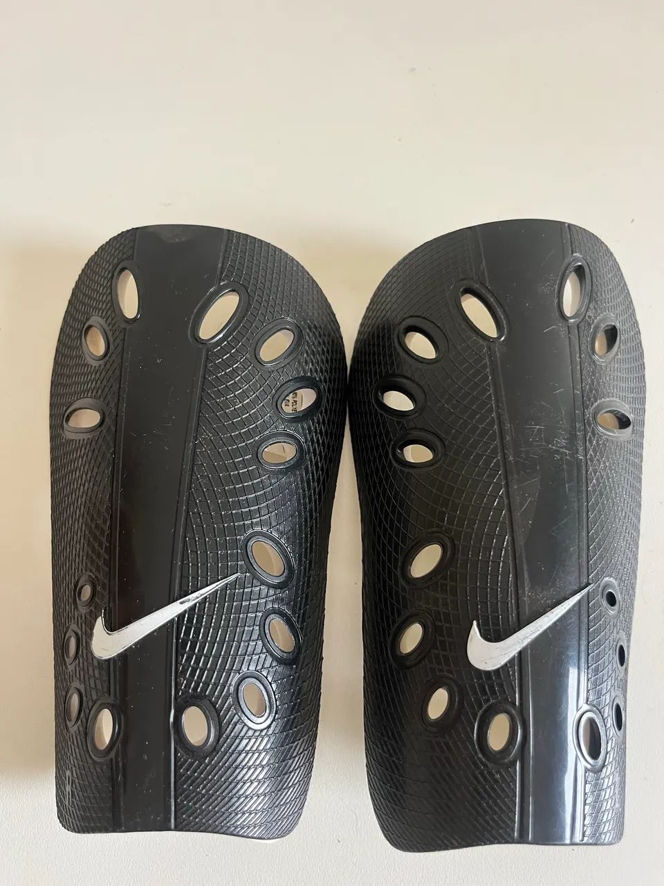 Caneleira Nike 