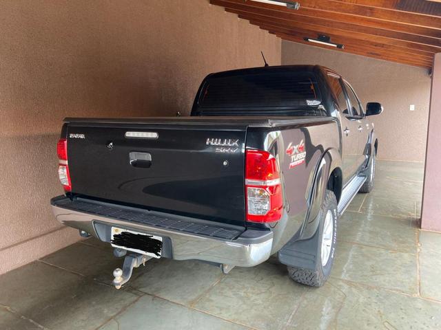 Hilux srv 2013/2013 preta diesel 85.100 km impecável sem detalhes 4 pneus bfgoodrich zero - Foto 6