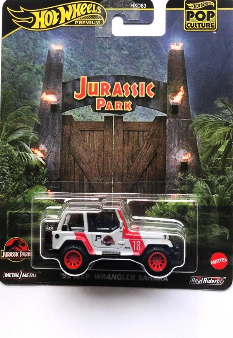 hot wheels jurassic park 92 jeep wrangler sahara pneus de borracha premium - Foto 2